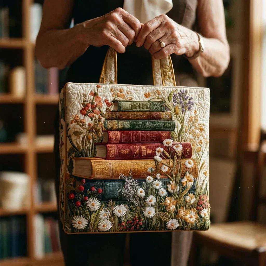 Emma | Gesteppte Tragetasche mit Motiv Bücher und Gänseblümchen